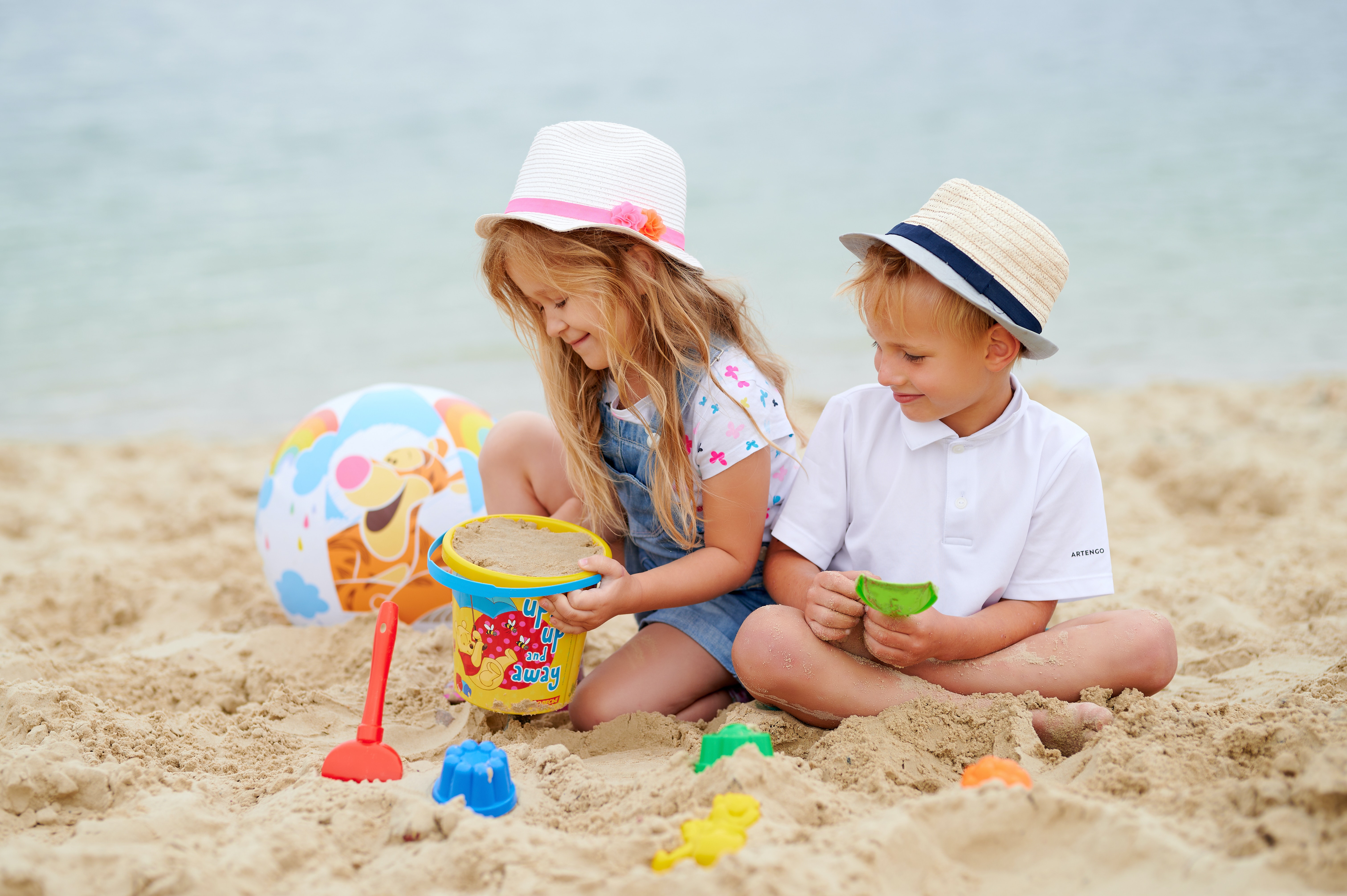 photo by polesie toys: https://www.pexels.com/photo/photo-of-a-girl-and-a-boy-playing-on-the-sand-together-6138085/