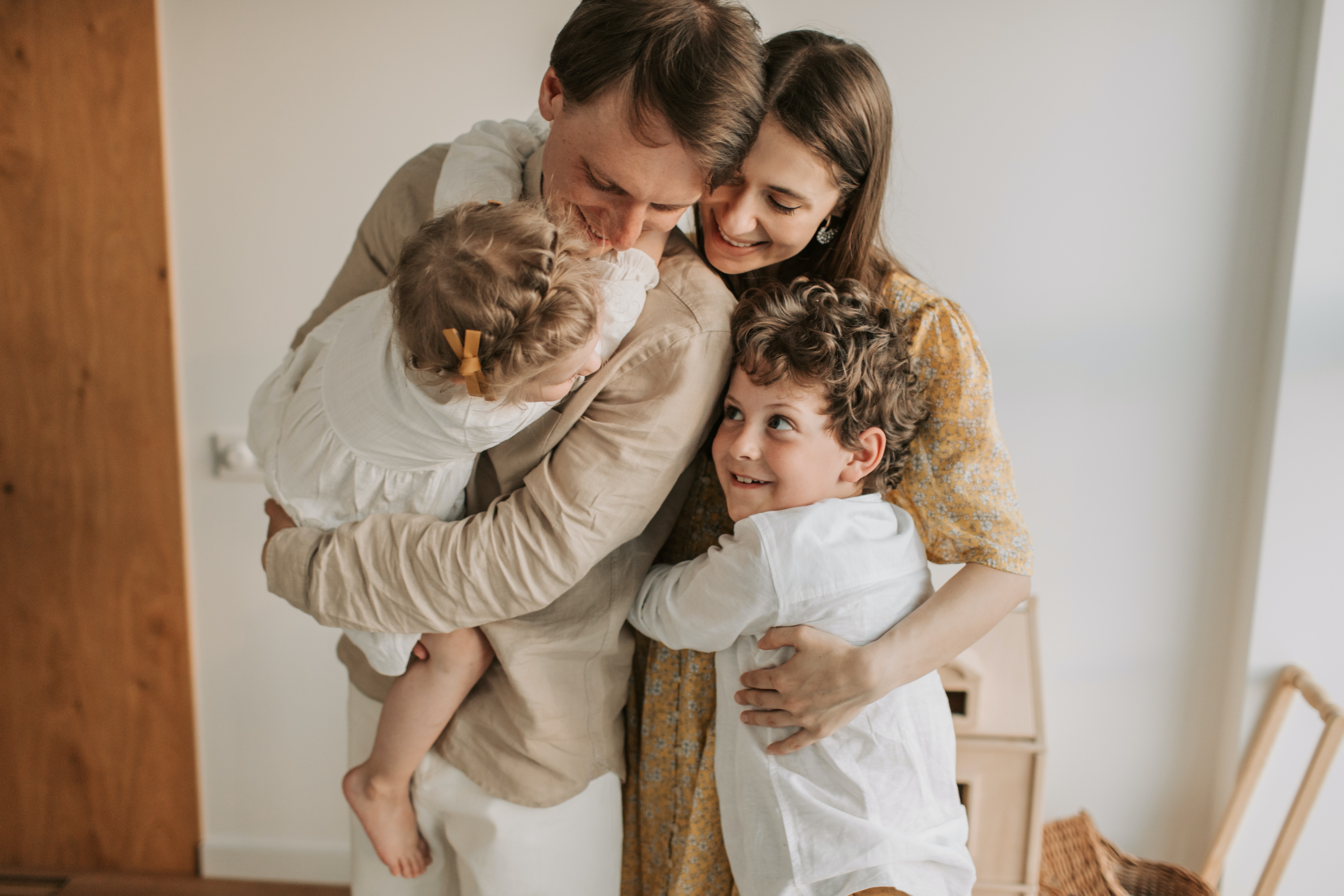 photo by vlada karpovich: https://www.pexels.com/photo/happy-family-hugging-4617316/